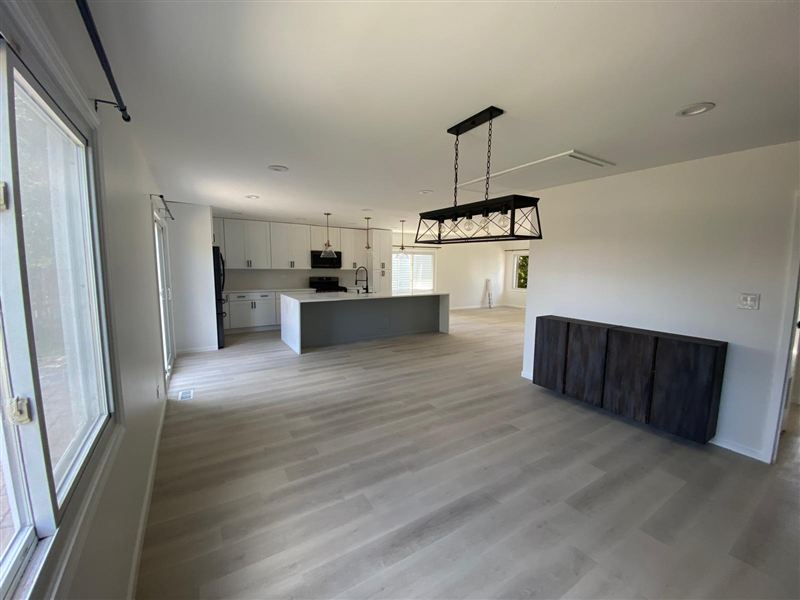 Open concept dining living space completed by NG Construction & Improvements