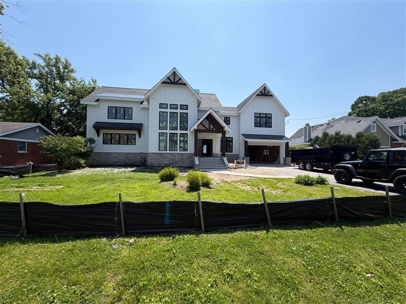 Grey asphalt shingles modern farmhouse completed by NG Construction & Improvements